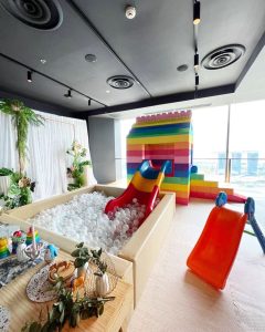 rainbow brickhouse with transparent ball pit for birthday party 1