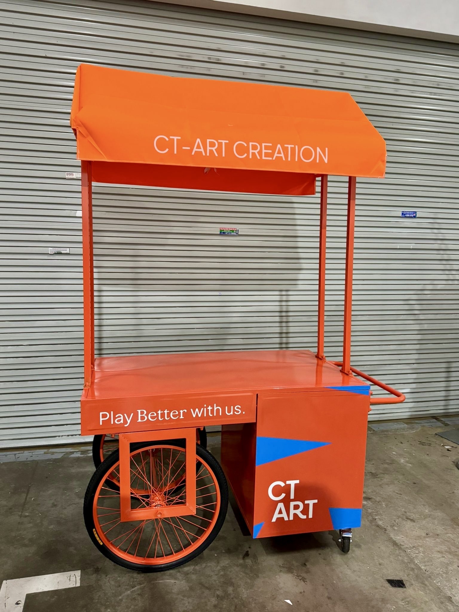 Push Cart Rental in Singapore 18 Customisable orange CT-ART branded mobile push cart for events in Singapore