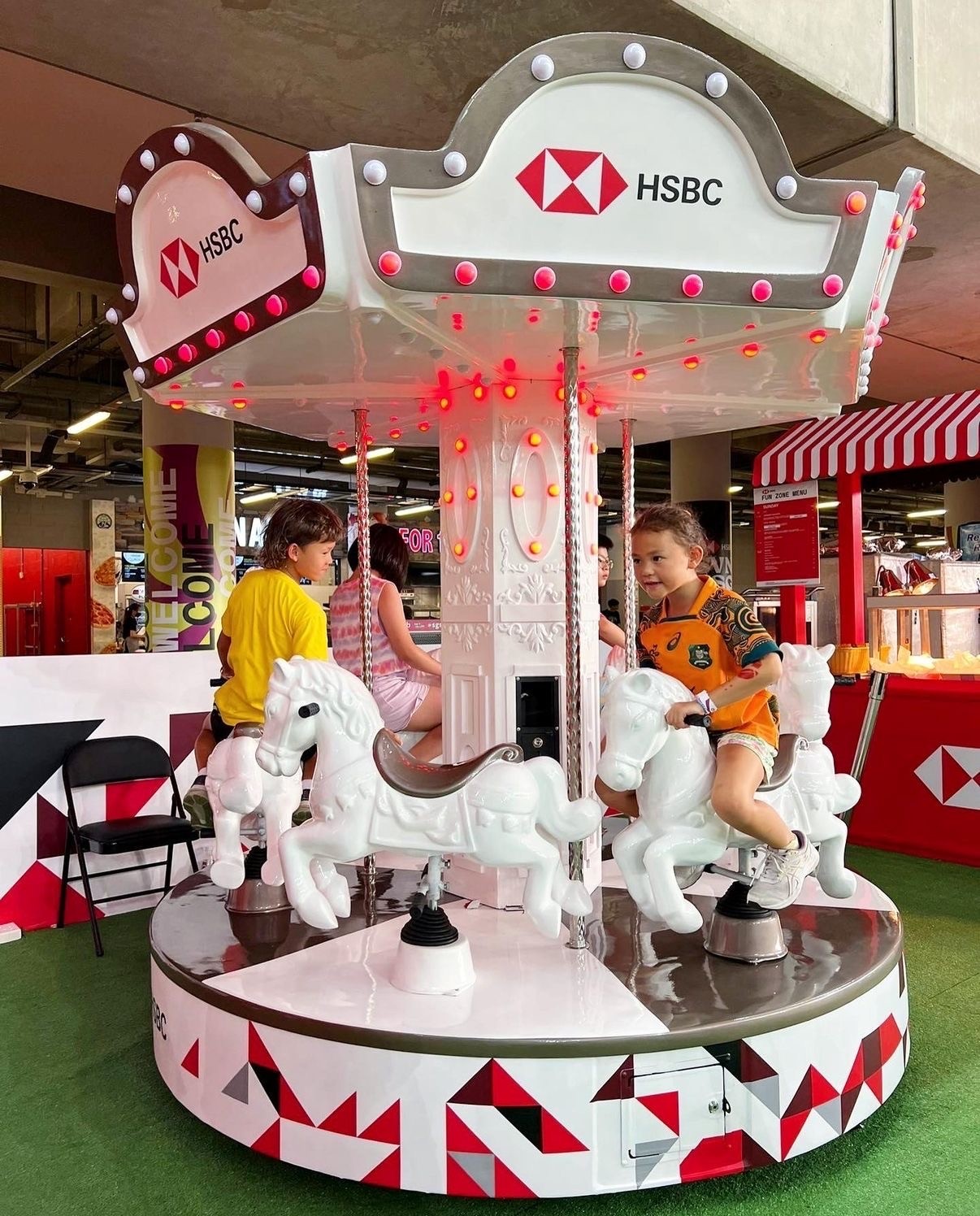 Branded mini carousel carnival ride for corporate event in Singapore