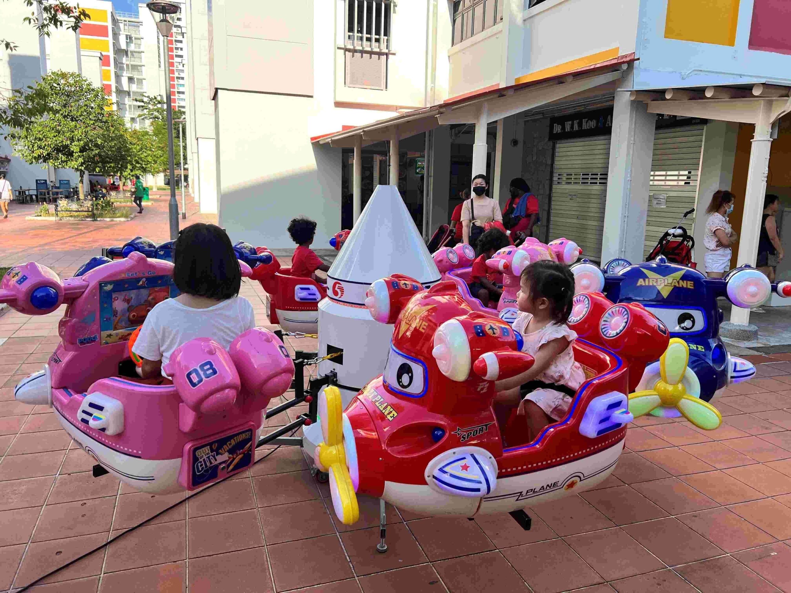 Kids airplane carousel carnival ride rental for community event Singapore