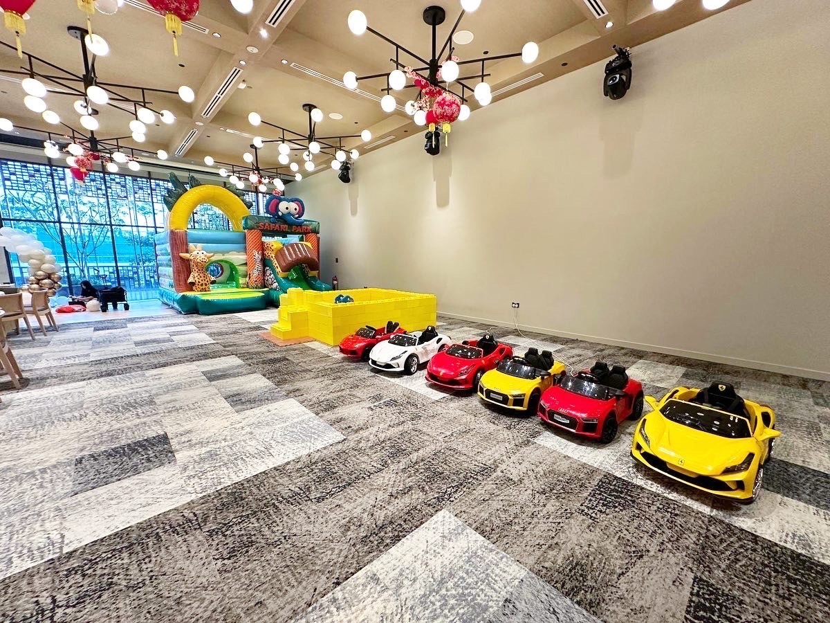 Kids ride-on cars with bouncy castle and ball pit party rental Singapore