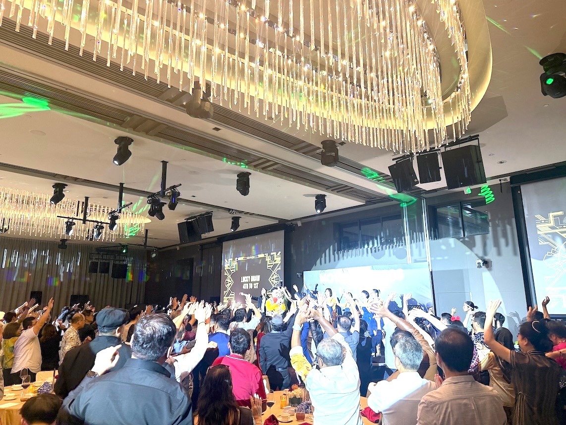 Lucky Draw Singapore corporate dinner with AV and lighting setup
