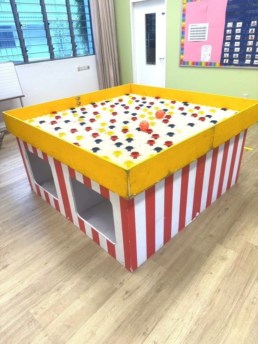 Ball Drop carnival game booth rental at a school event in Singapore