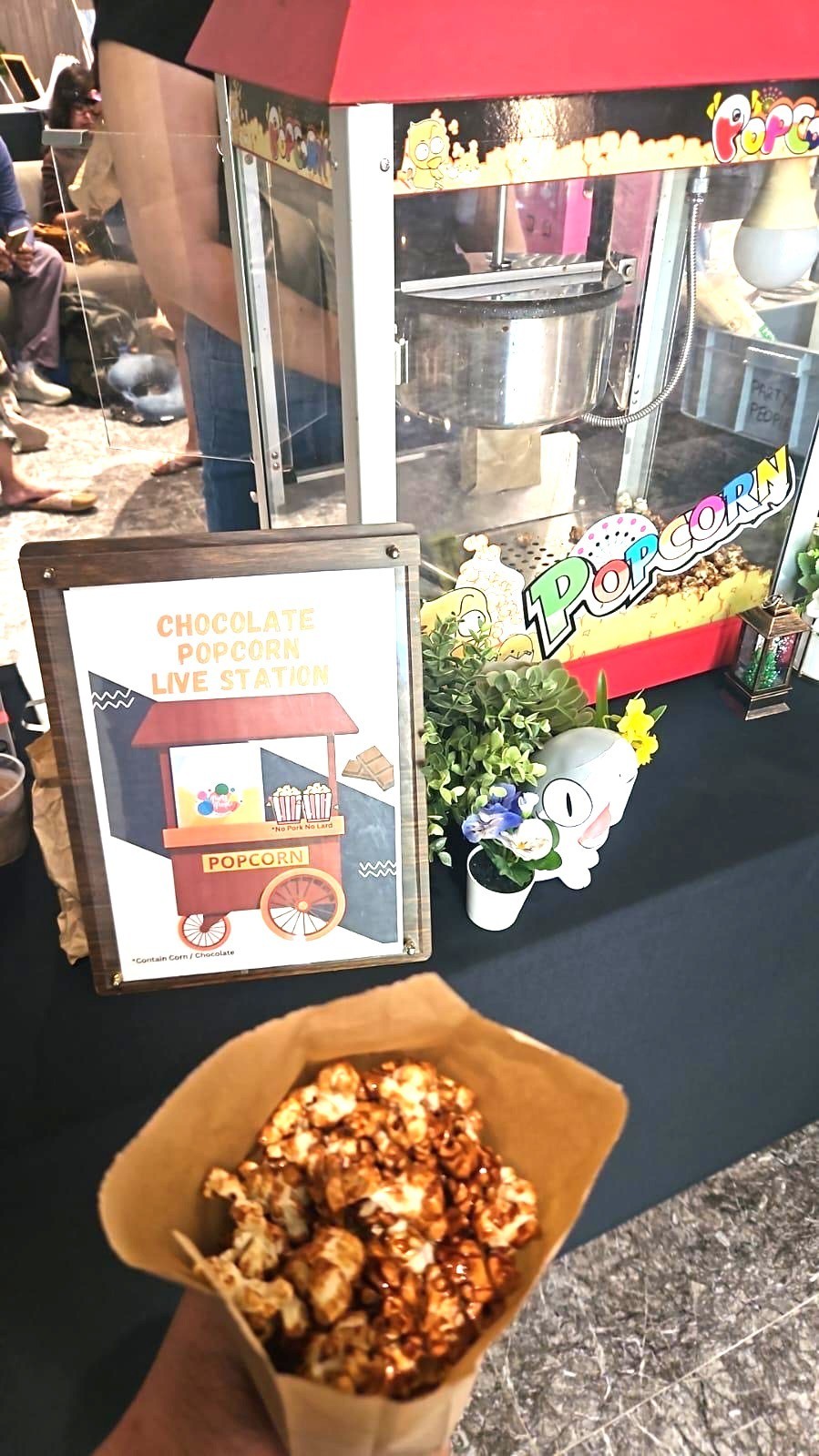 Chocolate popcorn live food station rental for corporate event in Singapore