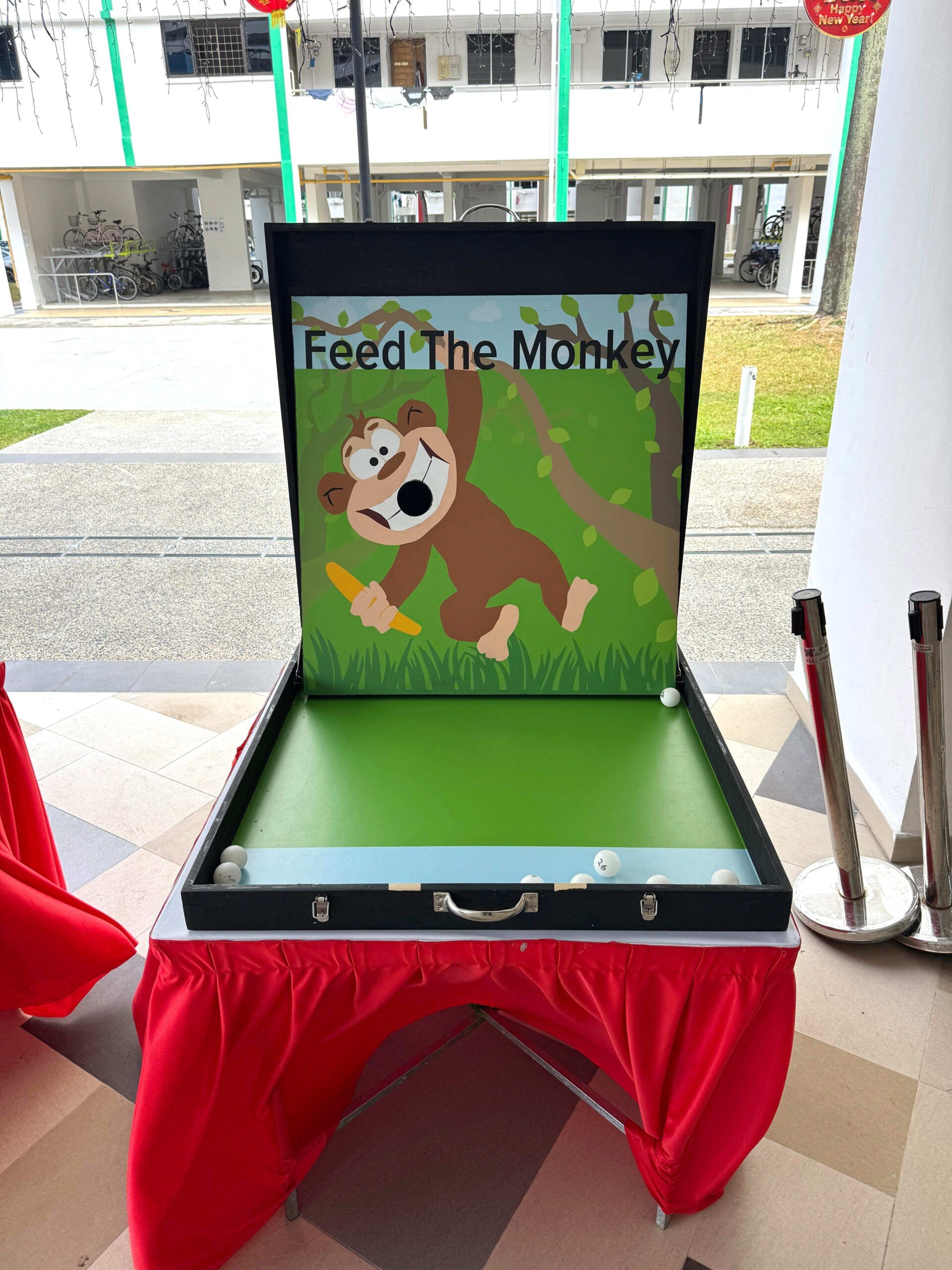 Feed the monkey carnival game booth rental Singapore