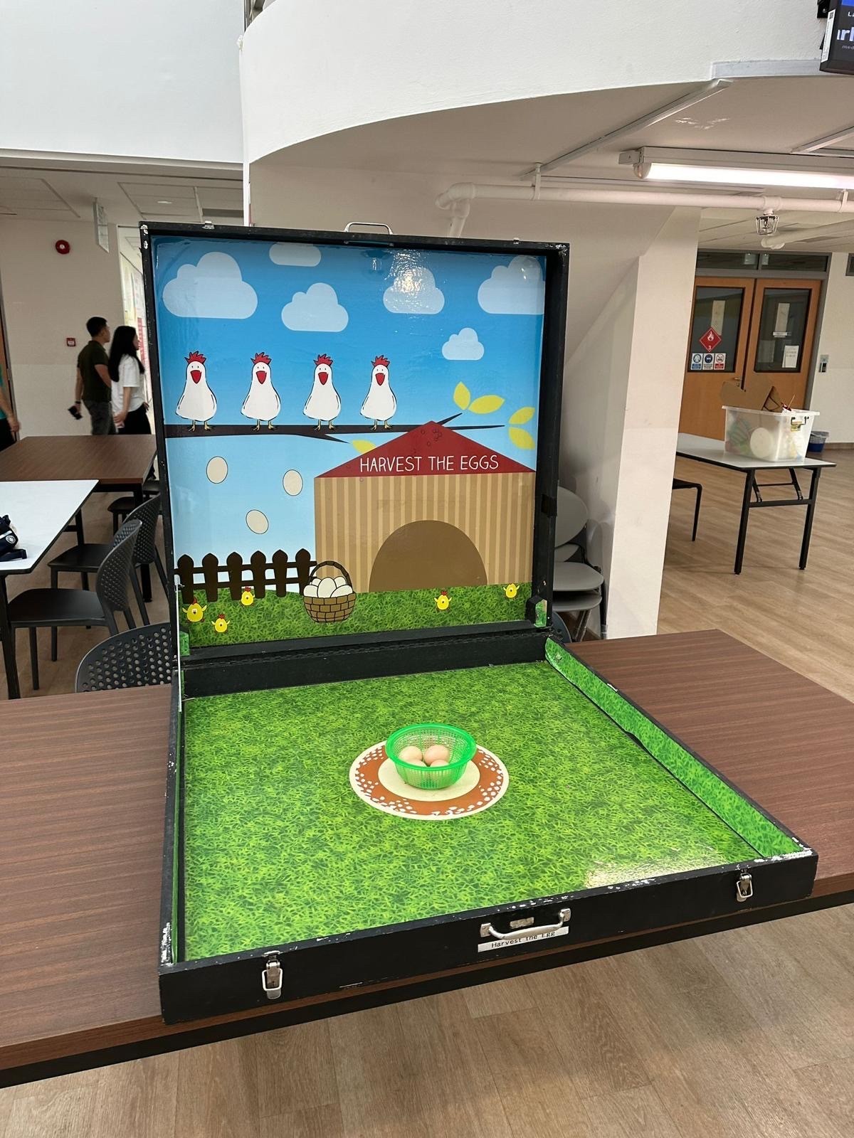Harvest the eggs carnival game rental Singapore