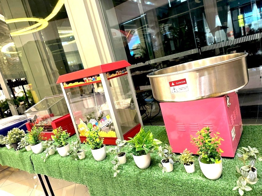 Popcorn and cotton candy machine rental at corporate event live food station Singapore
