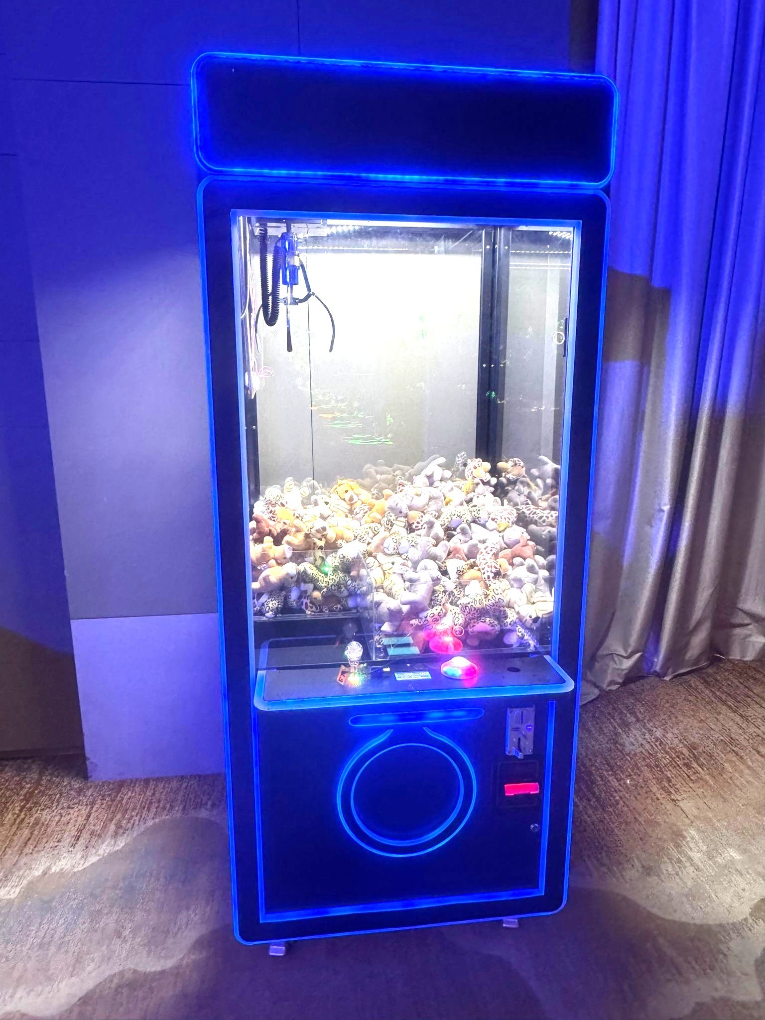 Arcade Games Singapore: Top Rentals for Your 2026 Event 12 Blue LED claw machine arcade rental with plush toys Singapore