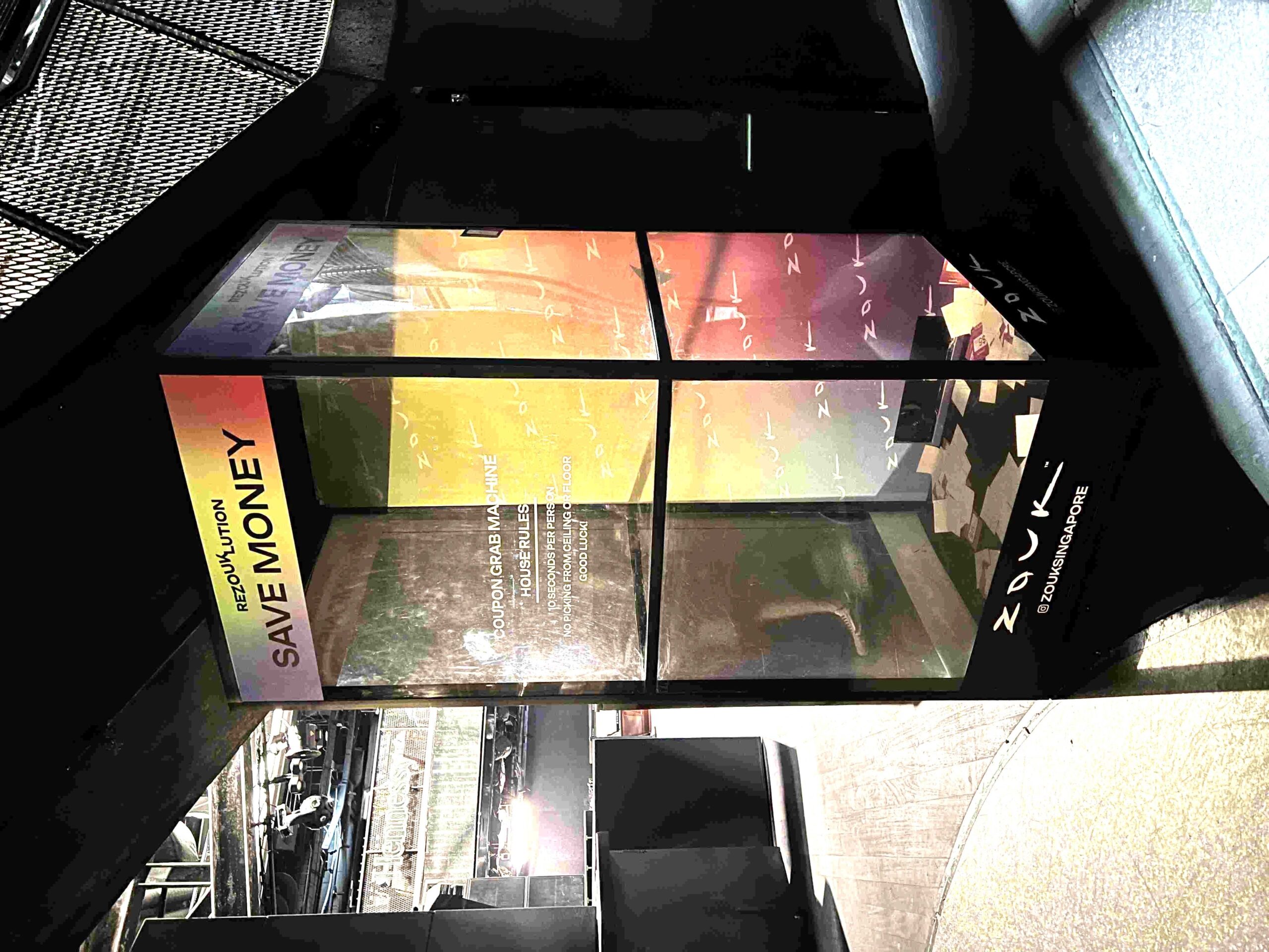 Arcade Games Singapore: The Ultimate Rental Guide for 2026 Events 3 Coupon grab machine at Zouk corporate event rental Singapore