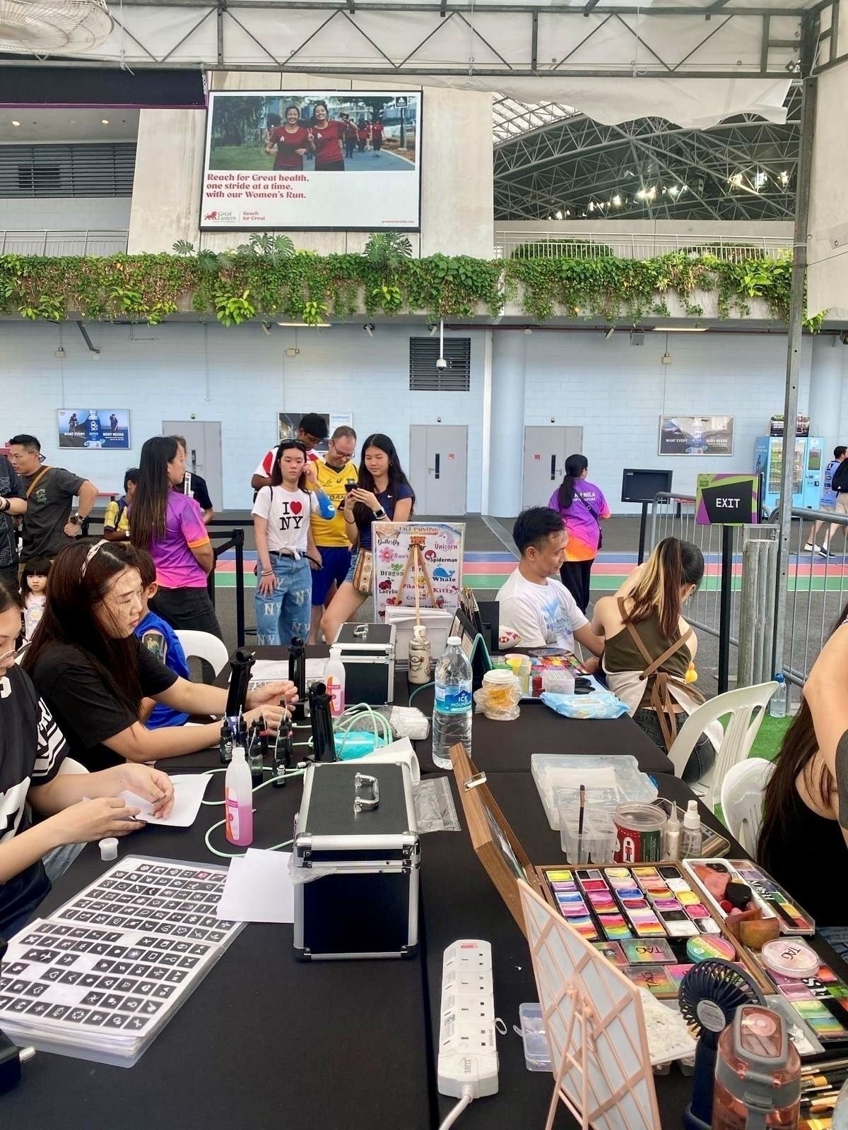 Face painting and airbrush tattoo fringe activity booth in Singapore
