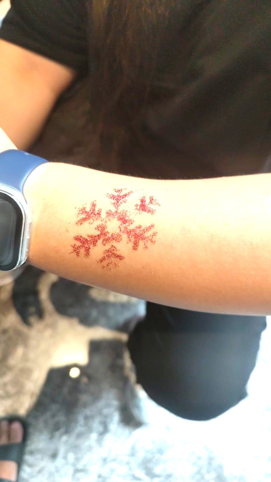 Glitter tattoo snowflake fringe activity for kids event in Singapore
