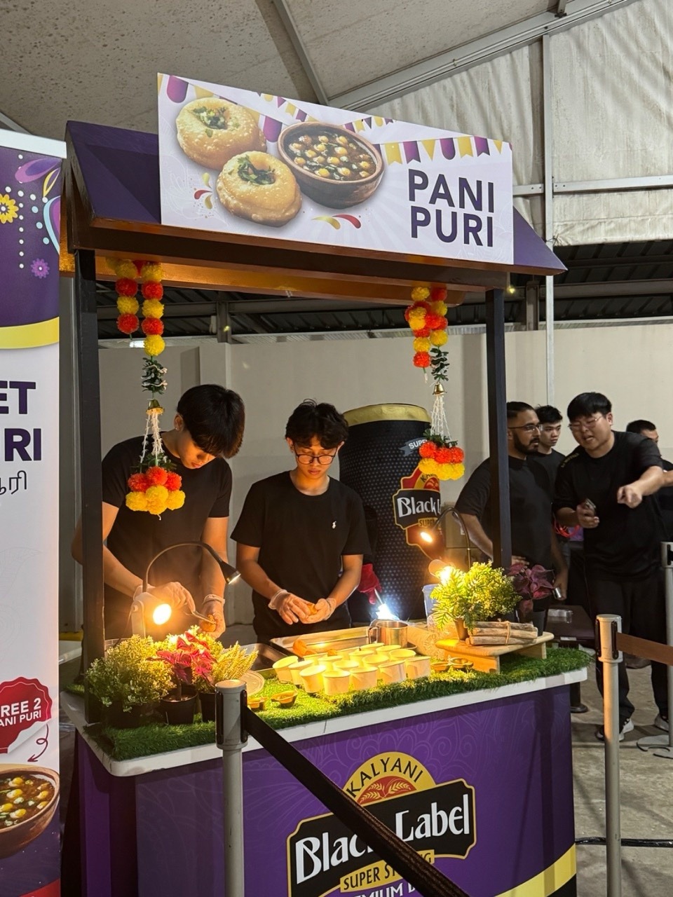 Pani Puri Live Station Catering in Singapore with crew preparing portions