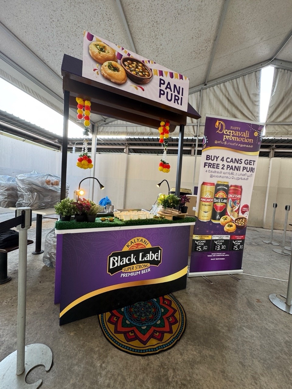 Pani puri live station booth with festive event decorations in Singapore