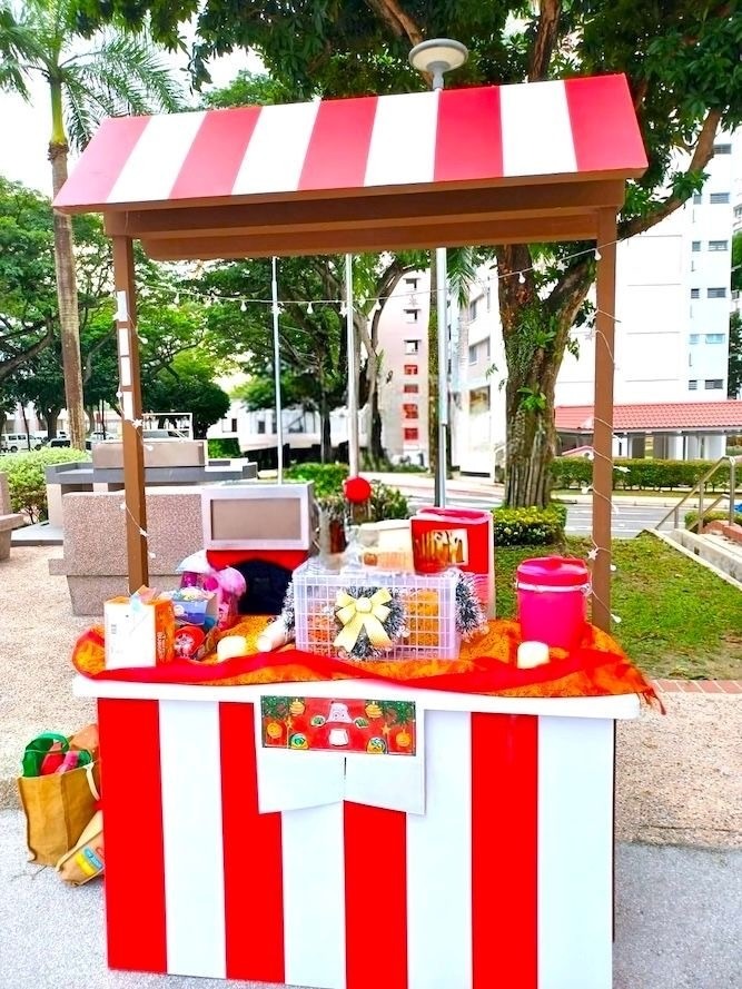 Red and white striped carnival stall booth rental in Singapore