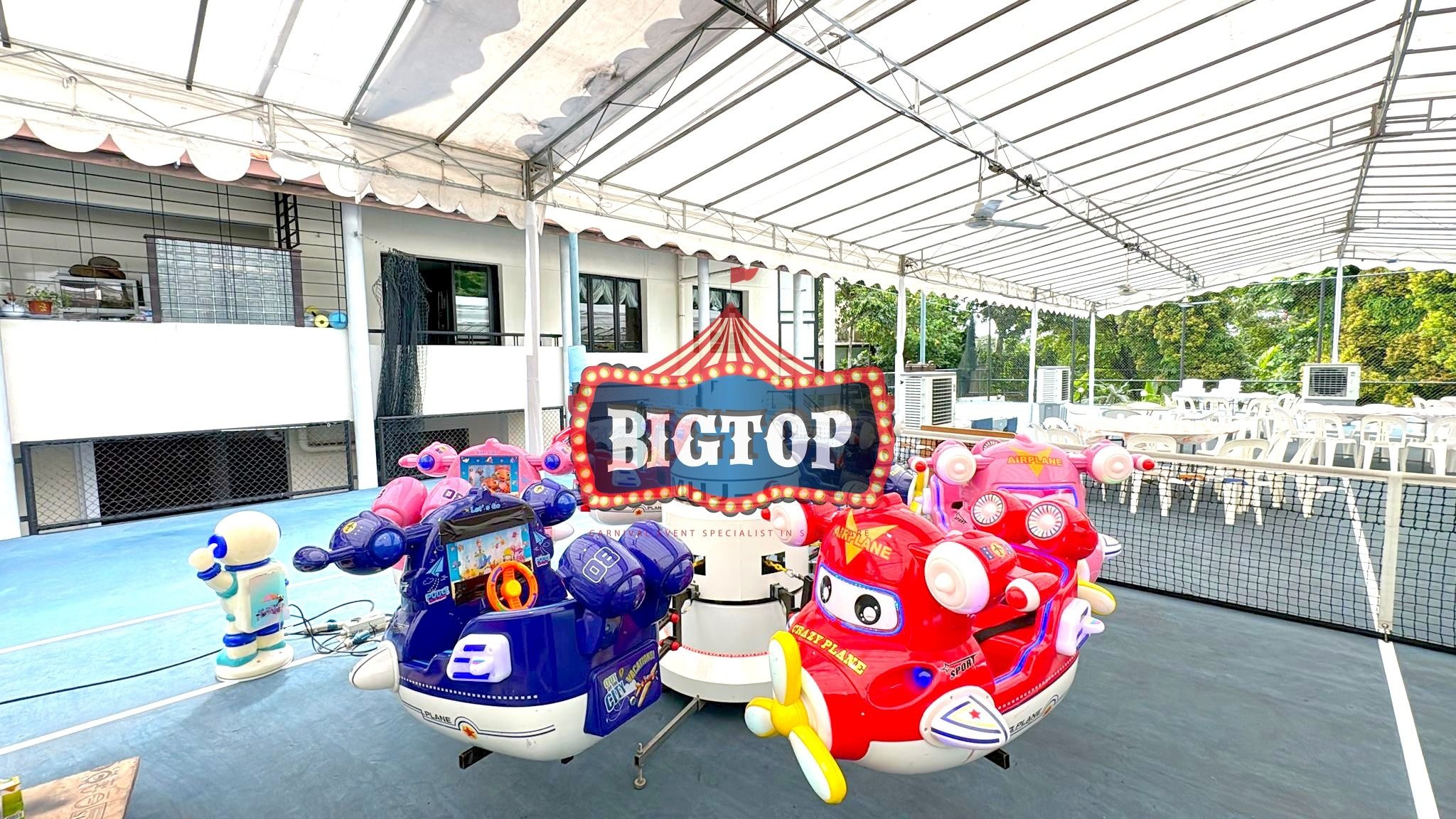 Carnival Rides for a Family Day: Trains, Animal Rides and Go-Karts 5 Colourful aeroplane ride under a covered court