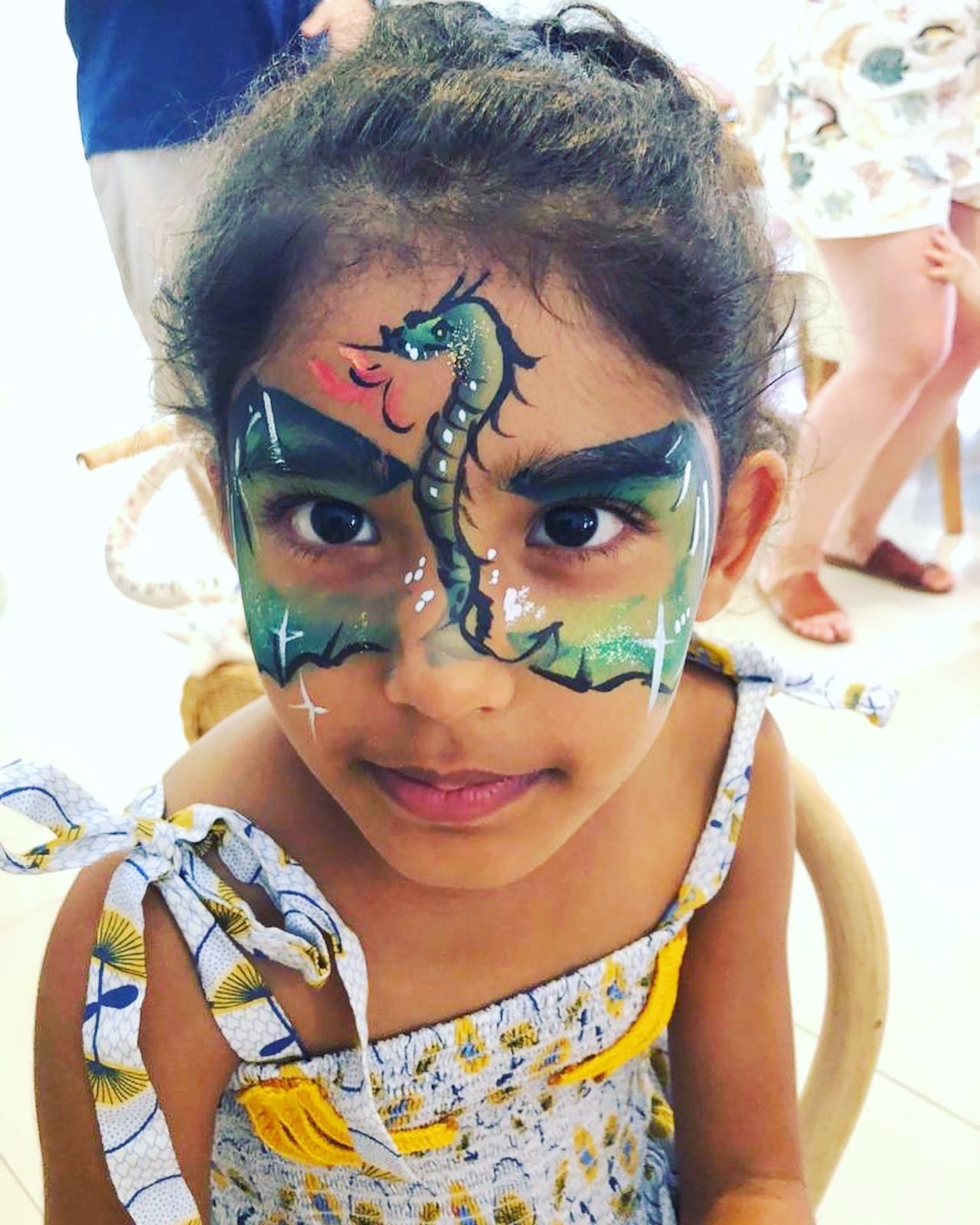 Creative Fringe Activities: 6 Smart Ways to Plan a Personalised Event 6 Green dragon face painting design