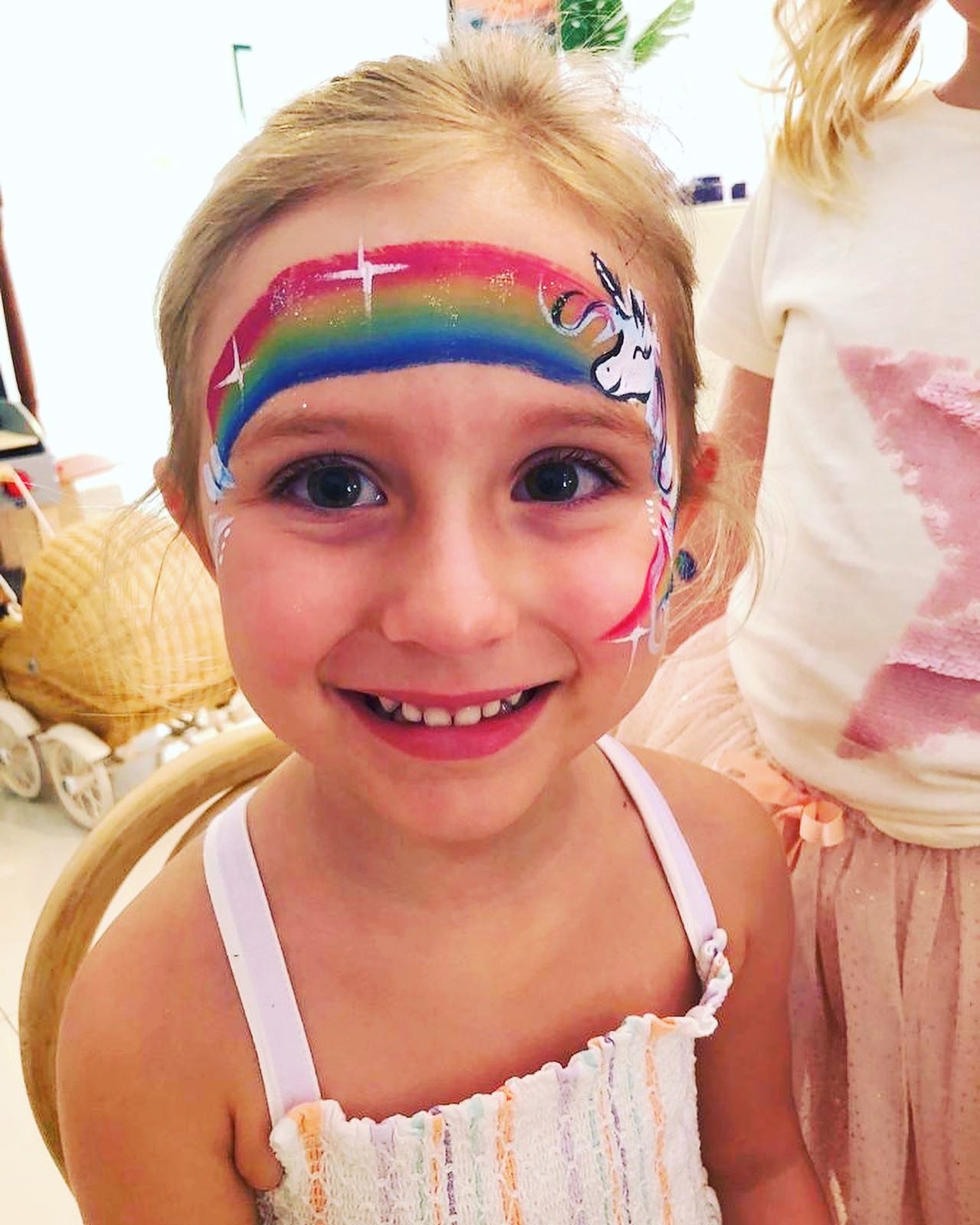 Creative Fringe Activities: 6 Smart Ways to Plan a Personalised Event 5 Rainbow unicorn face painting at a party