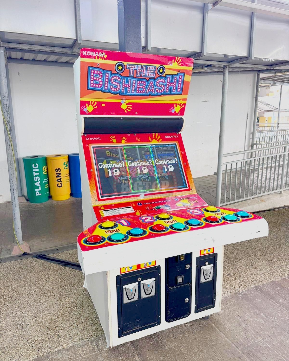Arcade Party Ideas: From a Neon Games Room to a Racing Lounge 9 Bishi Bashi cabinet in a covered corridor