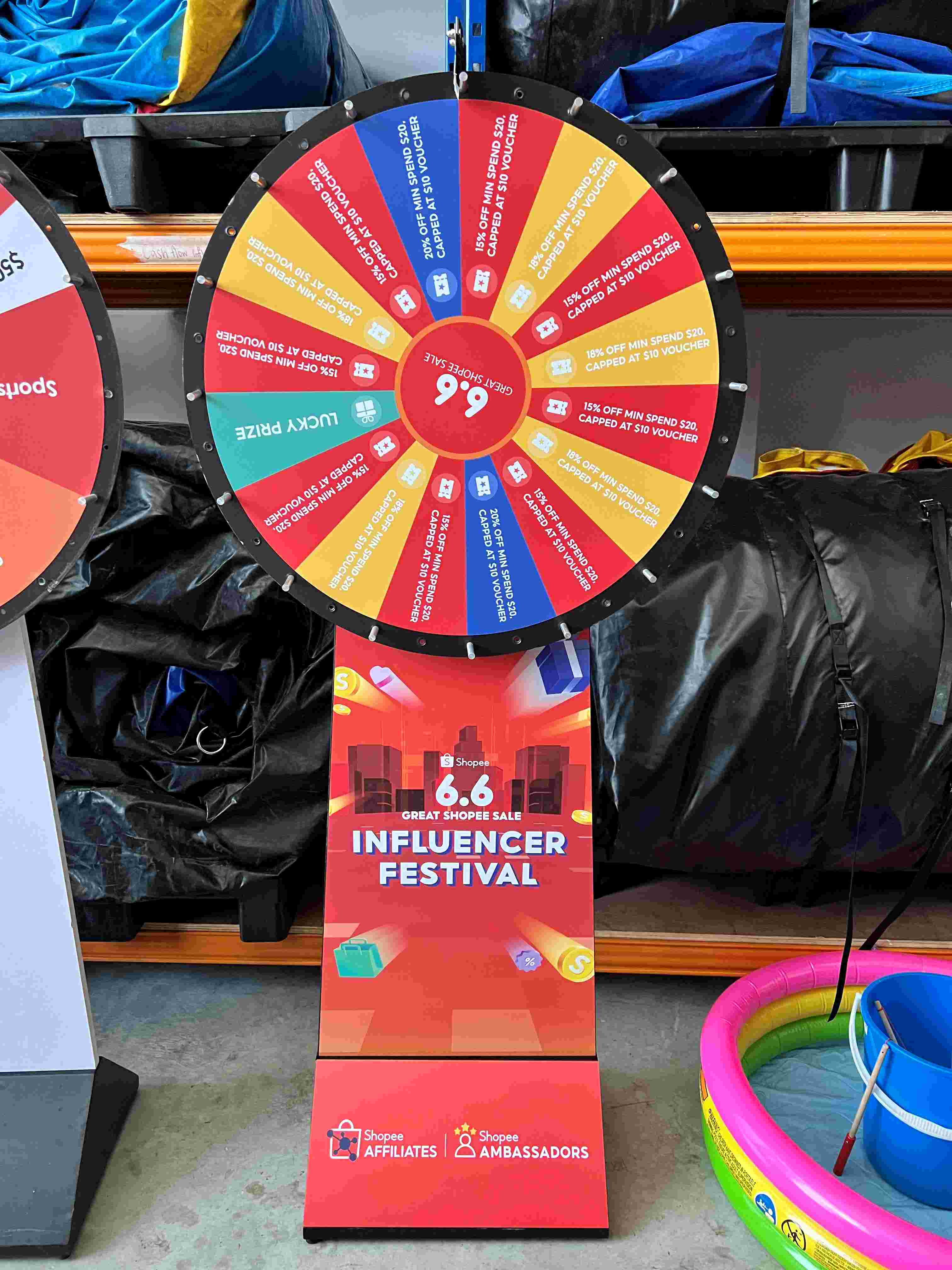 Prize Wheel Artwork: Making Every Segment Easy to Read 8 Red festival prize wheel with coordinated pedestal graphics